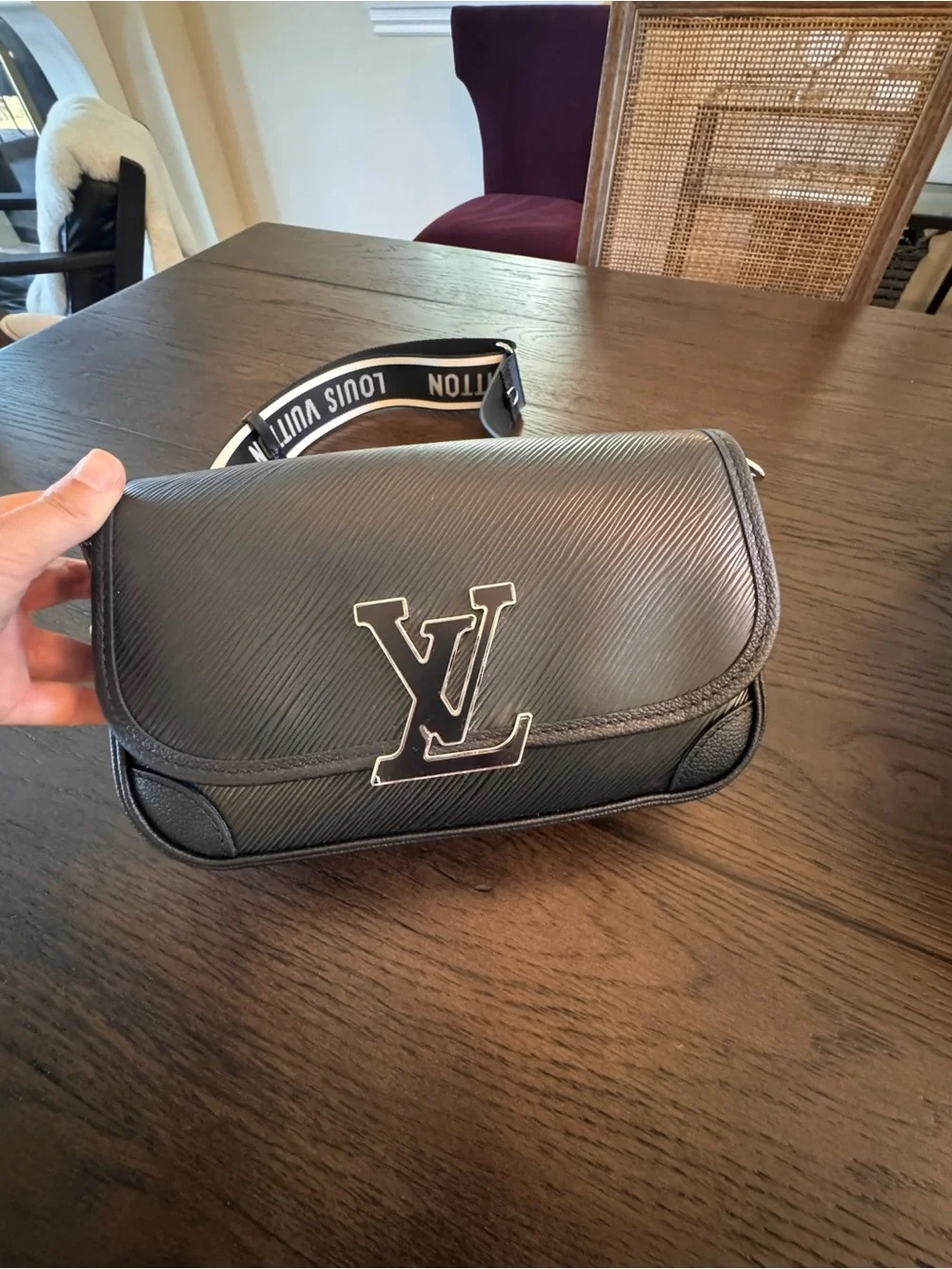 Brand new Louis Vuitton Black Buci bag with 2 Louis Vuitton straps.